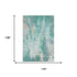 9' X 12' Teal Peach And Ivory Abstract Washable Area Rug With UV Protection