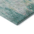 9' X 12' Teal Peach And Ivory Abstract Washable Area Rug With UV Protection