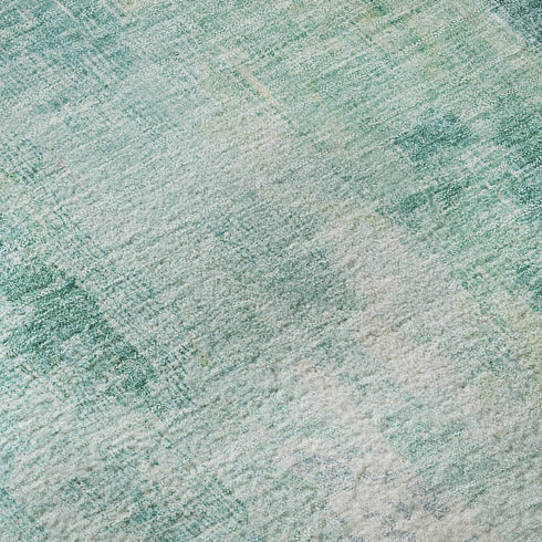 9' X 12' Teal Peach And Ivory Abstract Washable Area Rug With UV Protection