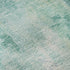 9' X 12' Teal Peach And Ivory Abstract Washable Area Rug With UV Protection