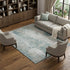 8' X 10' Turquoise And Ivory Abstract Washable Area Rug With UV Protection