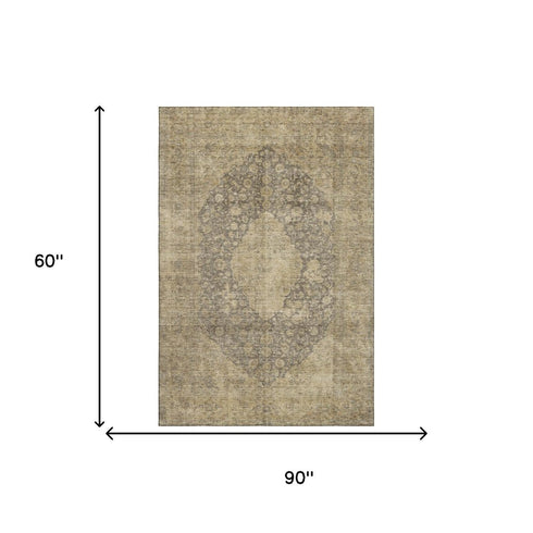 5' X 8' Brown Beige And Taupe Medallion Washable Area Rug With UV Protection