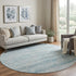 8' Teal Beige And Ivory Abstract Geometric Washable Round Rug With UV Protection