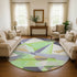 8' Lavender Green And Ivory Geometric Washable Round Rug With UV Protection