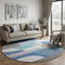8' Sky Blue Teal And Ivory Geometric Washable Round Rug With UV Protection