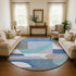 8' Sky Blue Teal And Ivory Geometric Washable Round Rug With UV Protection
