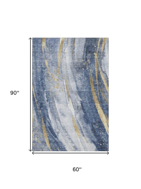 5' X 8' Blue Gold And Ivory Abstract Washable Area Rug With UV Protection