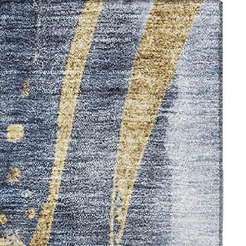 5' X 8' Blue Gold And Ivory Abstract Washable Area Rug With UV Protection