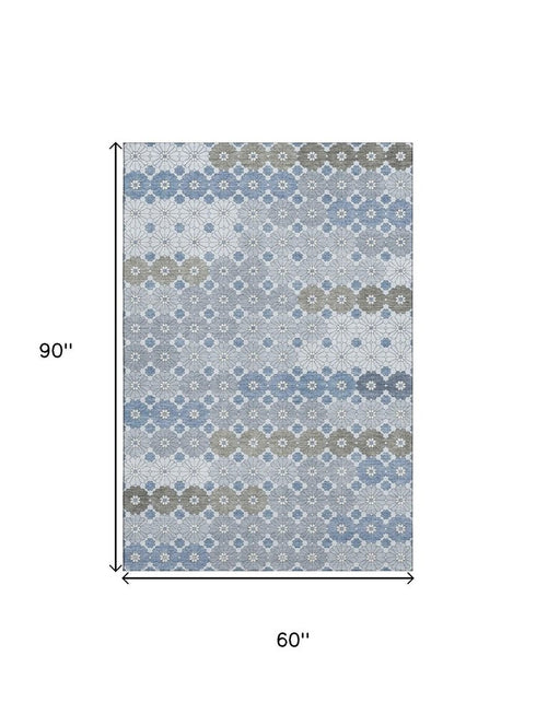 5' X 8' Denim Blue Gray And Silver Geometric Washable Area Rug With UV Protection