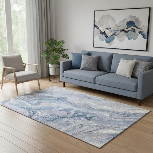 5' X 8' Denim Blue Gray And Ivory Abstract Washable Area Rug With UV Protection