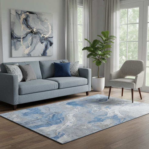 5' X 8' Blue Gray And Ivory Abstract Washable Area Rug With UV Protection
