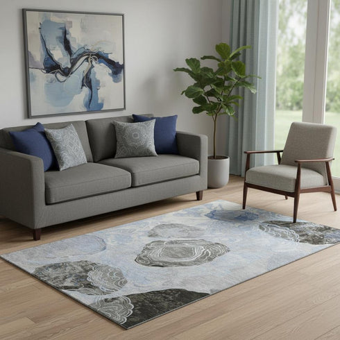 5' X 8' Sky Blue Charcoal And Ivory Geometric Washable Area Rug With UV Protection