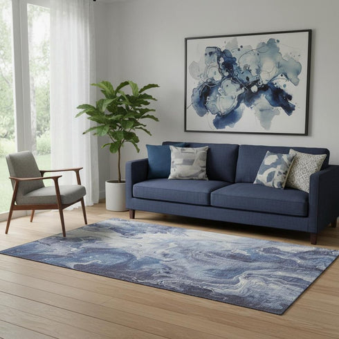 5' X 8' Blue And Ivory Abstract Washable Area Rug With UV Protection