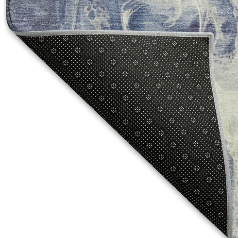 5' X 8' Blue And Ivory Abstract Washable Area Rug With UV Protection