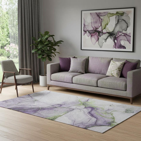 5' X 8' Purple Green And Ivory Abstract Washable Area Rug With UV Protection