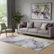 5' X 8' Purple Green And Ivory Abstract Washable Area Rug With UV Protection