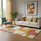 5' X 8' Coral Gold And Ivory Abstract Geometric Washable Area Rug With UV Protection