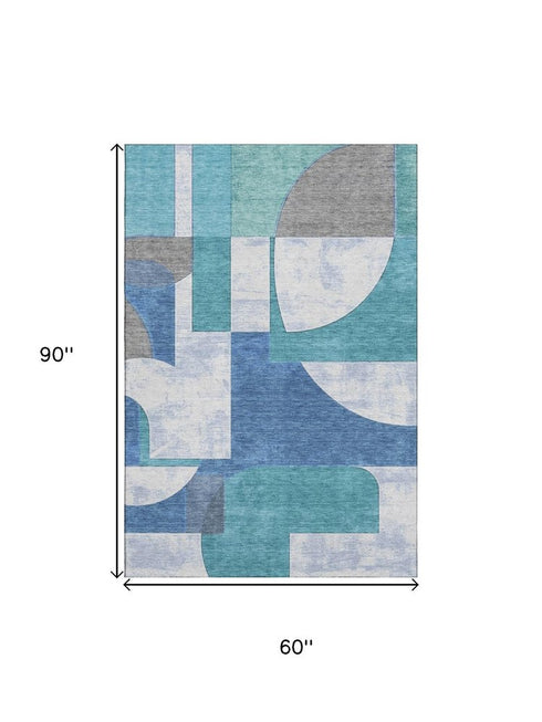 5' X 8' Teal Ivory And Gray Abstract Geometric Washable Area Rug With UV Protection