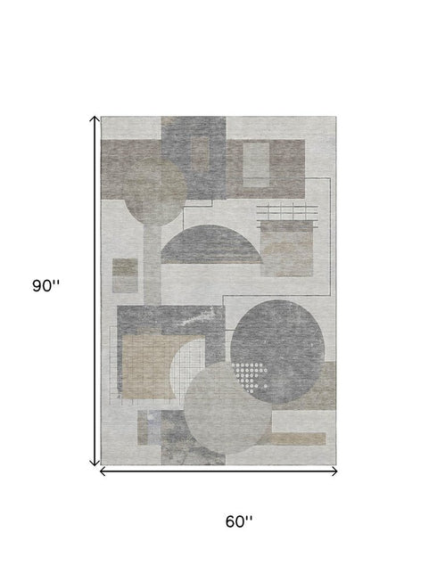 5' X 8' Beige Gray And Silver Geometric Washable Area Rug With UV Protection