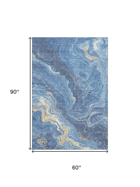 5' X 8' Blue Gold And Ivory Abstract Washable Area Rug With UV Protection