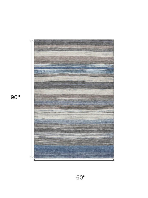 5' X 8' Denim Blue Ivory And Gray Striped Washable Area Rug With UV Protection