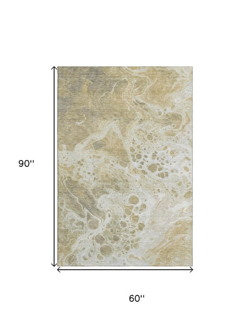 5' X 8' Gold Beige And Ivory Abstract Washable Area Rug With UV Protection