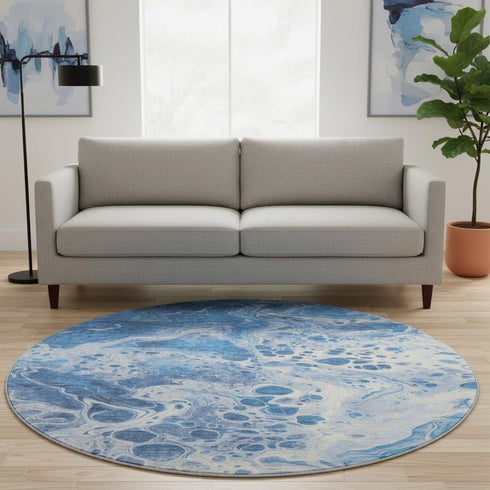8' Navy Blue And Ivory Abstract Washable Round Rug With UV Protection