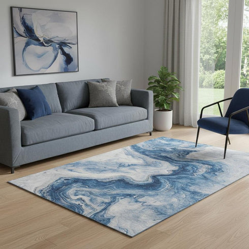 5' X 8' Navy Blue And Ivory Abstract Washable Area Rug With UV Protection
