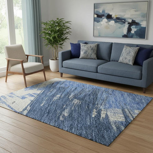 5' X 8' Navy Blue Green And Ivory Abstract Washable Area Rug With UV Protection