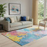 5' X 8' Blue Yellow And Pink Abstract Washable Area Rug With UV Protection