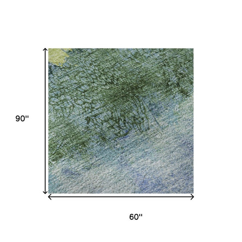 5' X 8' Blue Gold And Ivory Abstract Washable Area Rug With UV Protection
