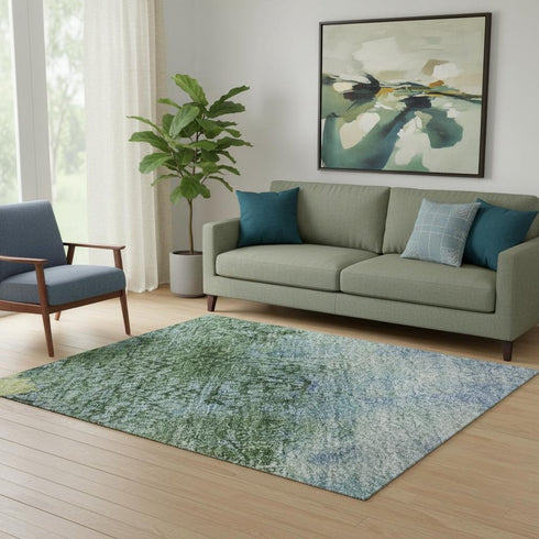 5' X 8' Blue Gold And Ivory Abstract Washable Area Rug With UV Protection