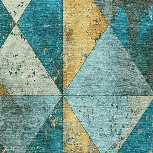 5' X 8' Teal Gold And Ivory Geometric Washable Area Rug With UV Protection