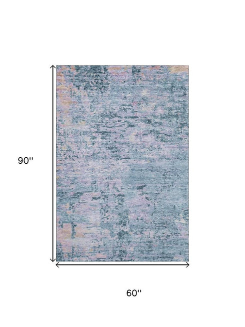 5' X 8' Blue And Lavender Abstract Washable Area Rug With UV Protection
