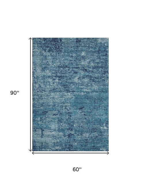 5' X 8' Denim Blue And Ivory Abstract Washable Area Rug With UV Protection