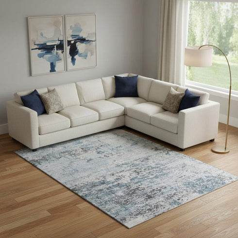 9' X 12' Sky Blue Ivory And Gray Abstract Washable Area Rug With UV Protection