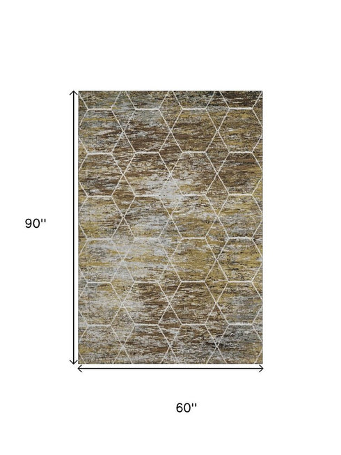 5' X 8' Brown Gold And Ivory Geometric Washable Area Rug With UV Protection