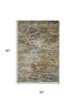 5' X 8' Brown Gold And Ivory Geometric Washable Area Rug With UV Protection