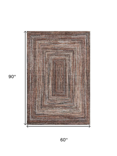 5' X 8' Terra Cotta And Beige Geometric Washable Area Rug With UV Protection
