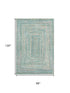 8' X 10' Teal And Ivory Geometric Washable Area Rug With UV Protection