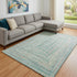 8' X 10' Teal And Ivory Geometric Washable Area Rug With UV Protection