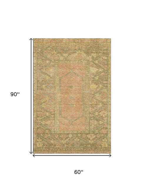 5' X 8' Coral And Gold Oriental Washable Area Rug With UV Protection