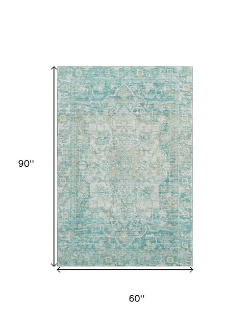 5' X 8' Teal Ivory And Beige Oriental Washable Area Rug With UV Protection