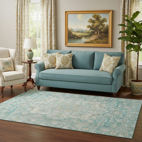 5' X 8' Teal Ivory And Beige Oriental Washable Area Rug With UV Protection