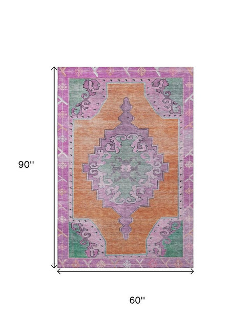 5' X 8' Orange Pink And Green Oriental Washable Area Rug With UV Protection