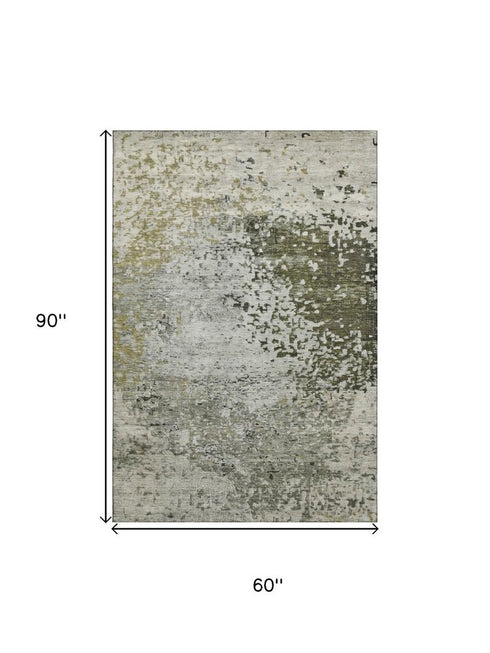 5' X 8' Graphite Green And Ivory Abstract Washable Area Rug With UV Protection
