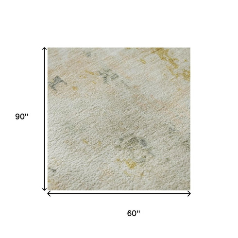 5' X 8' Beige Gold And Ivory Abstract Washable Area Rug With UV Protection