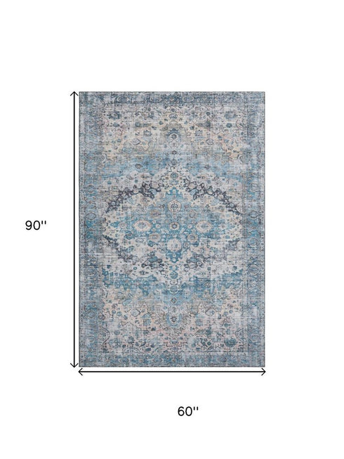 5' X 8' Blue Beige And Teal Oriental Washable Area Rug With UV Protection