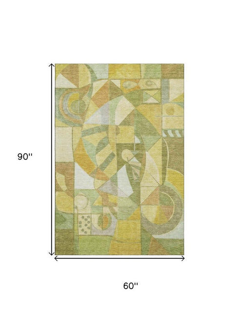 5' X 8' Fern Green Gold And Ivory Abstract Washable Area Rug With UV Protection
