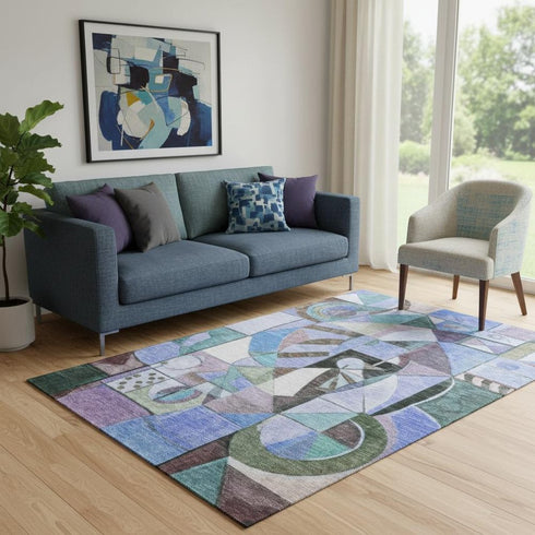 5' X 8' Green Blue And Ivory Abstract Washable Area Rug With UV Protection